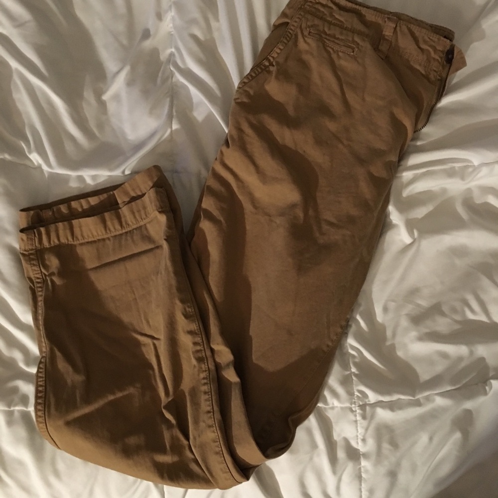 Sz 33x32 distressed chinos with tears